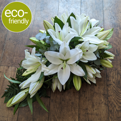 Eco-friendly Funeral Flowers, Lily Spray (White), oriental lilies - A traditional single ended funeral spray, sometimes called a tear drop spray, beautifully arranged in biodegradable floral foam. Our white lily spray is a timeless classic