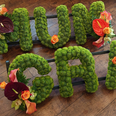 Modern Funeral Letters: A bold and beautiful way to remember - Our modern funeral letters are a bold and beautiful way to say goodbye to a loved one. Made with green pompom chrysanthemum ‘Kermit’, they are unique and memorable.