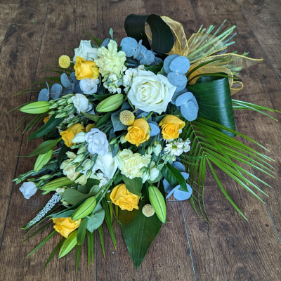 Elegant tied sheaf of white and yellow flowers, perfect for a funeral. - A beautiful and meaningful way to express your sympathy and condolences. This elegant tied sheaf of white and yellow flowers is perfect for laying at a funeral | Darlington Florist
