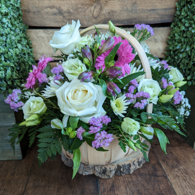 Pastel Trug Basket Arrangement: Florist Choice, Darlington delivery - Order a unique, pastel trug basket arrangement filled with the freshest blooms, direct from our florist in Cockerton. Same day delivery or Click & Collect available.