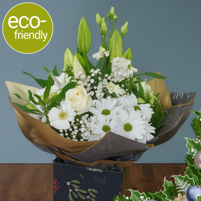 White Christmas: Enchanting winter blooms, magical snow-kissed bouquet - Unwrap a winter wonderland with our White Christmas bouquet, a captivating collection of winter blooms beautifully hand-tied. Order today for same-day delivery or Click & Collect.